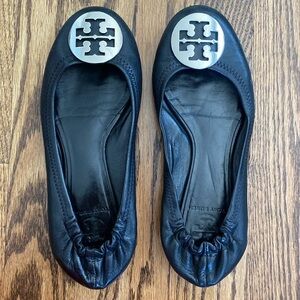 Black Tory Burch Reva ballet flats with silver logo. Good used condition